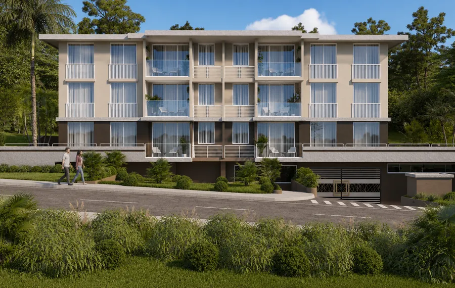 Fachada frontal de Clayton Lux con balcones y acceso a los estacionamientos